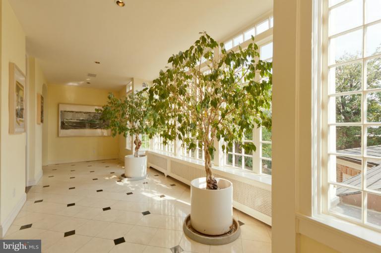 3122 N Street Northwest Washington, DC 20007 - Photo 6 of 19 a view of a bathroom with a sink and a bath tub