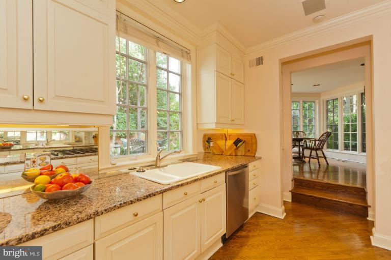 3122 N Street Northwest Washington, DC 20007 - Photo 9 of 19 a spacious bathroom with stainless steel appliances granite countertop a sink and a window