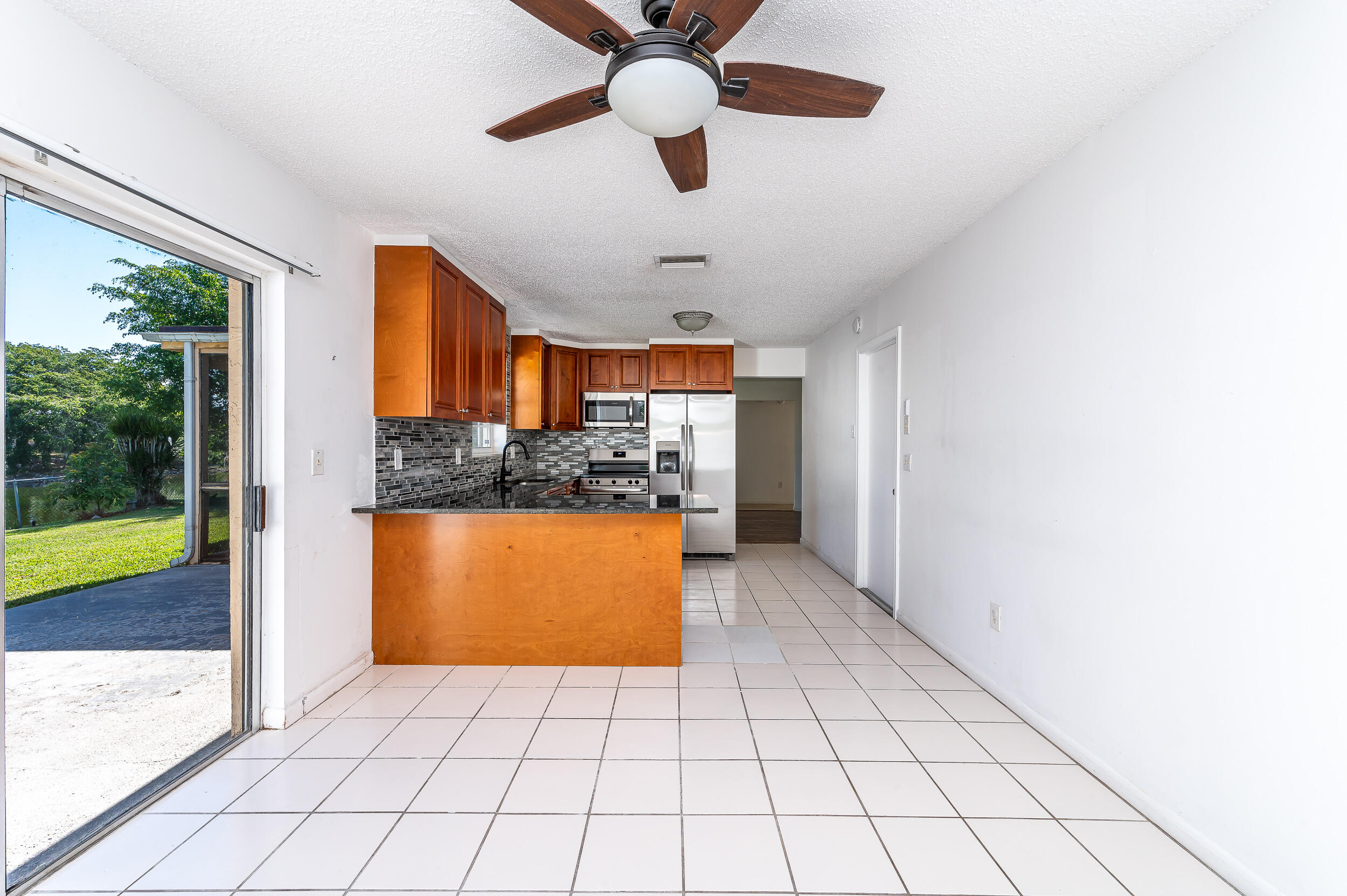 10905 Eureka Street Boca Raton, FL 33428 - Photo 10 of 16 a view interior of a house and natural light