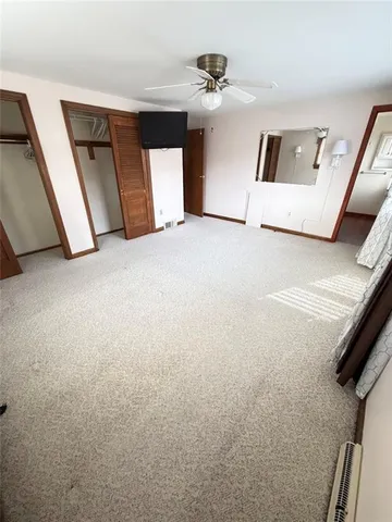 a view of a livingroom with a staircase
