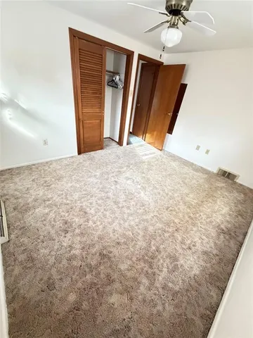 a view of a livingroom with a staircase