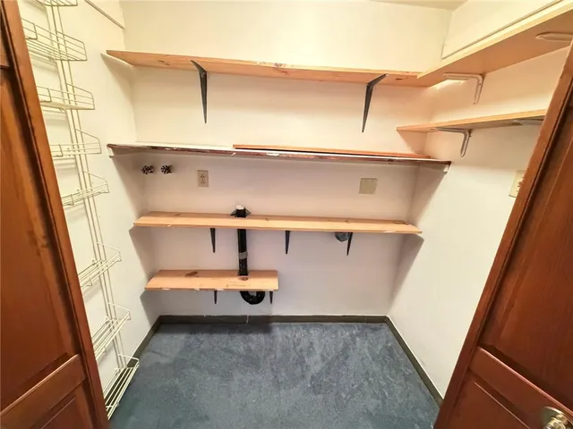 a view of a livingroom with a staircase