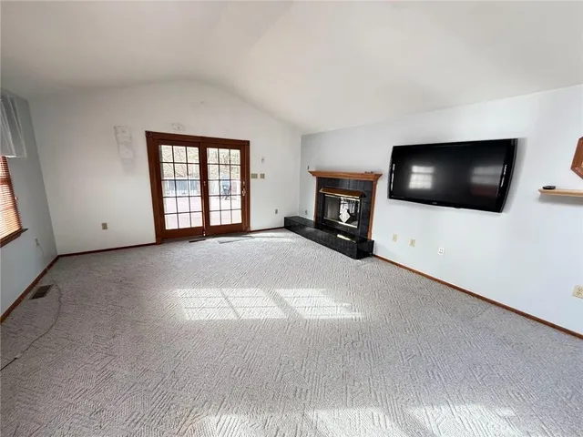 a view of livingroom with furniture and fireplace