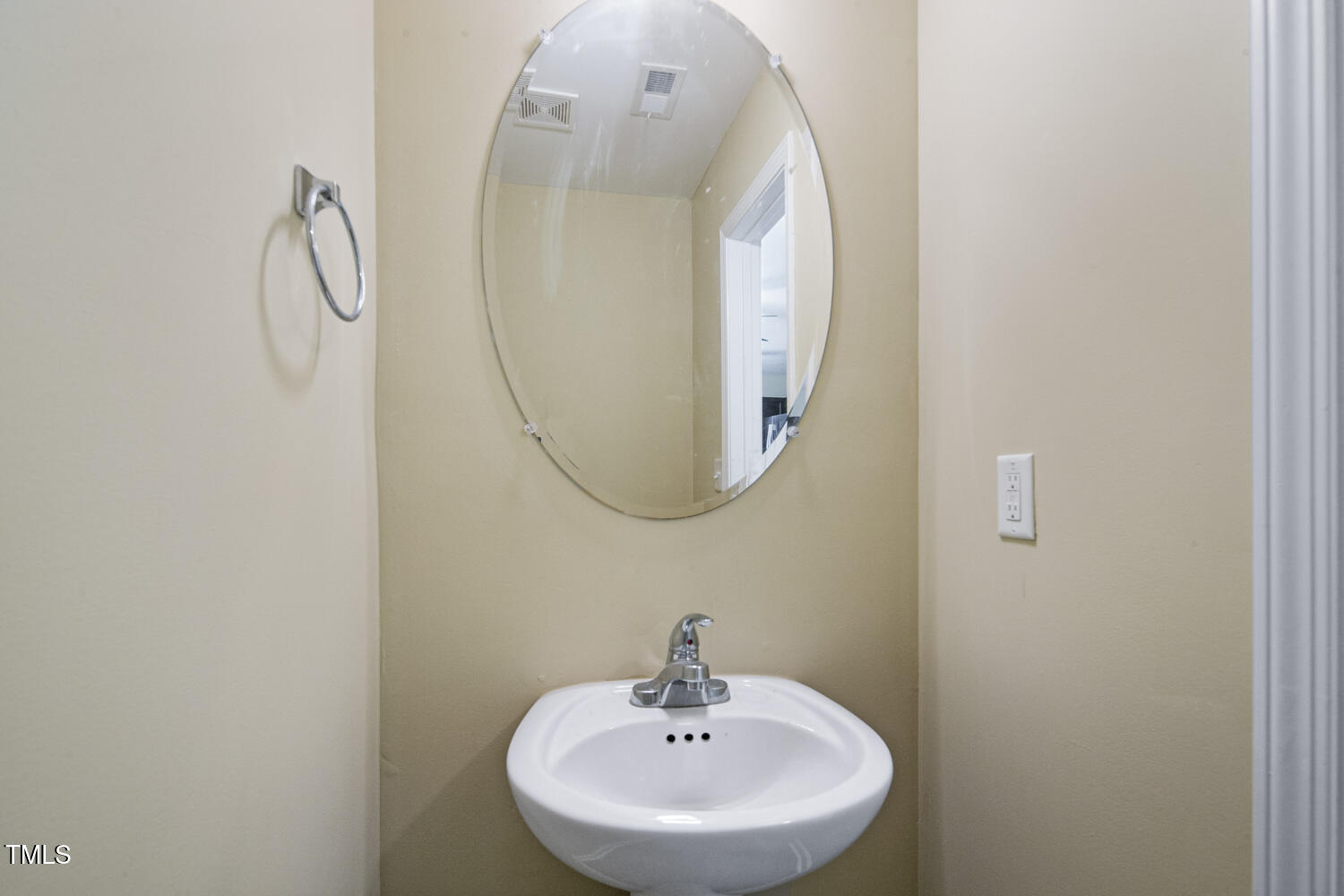 1536 Ricochet Drive Raleigh, NC 27610 - Photo 12 of 31 a bathroom with a sink and mirror