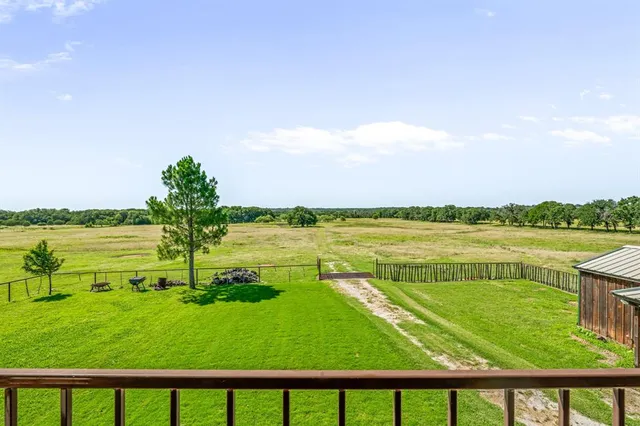 a view of a lake with a big yard