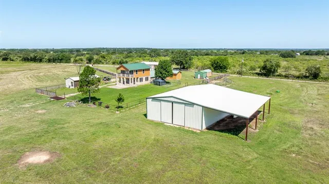 a view of a terrace with a garden and mountain view
