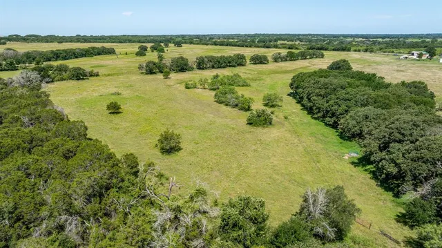a view of a lake with a city
