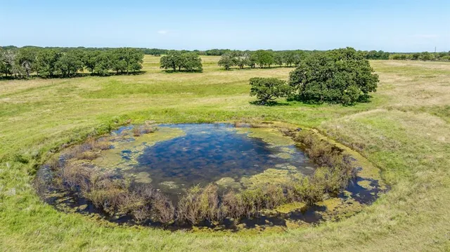 a view of a yard with an outdoor space and seating