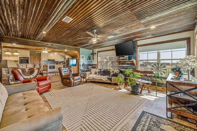 a view of a studio with wooden floor