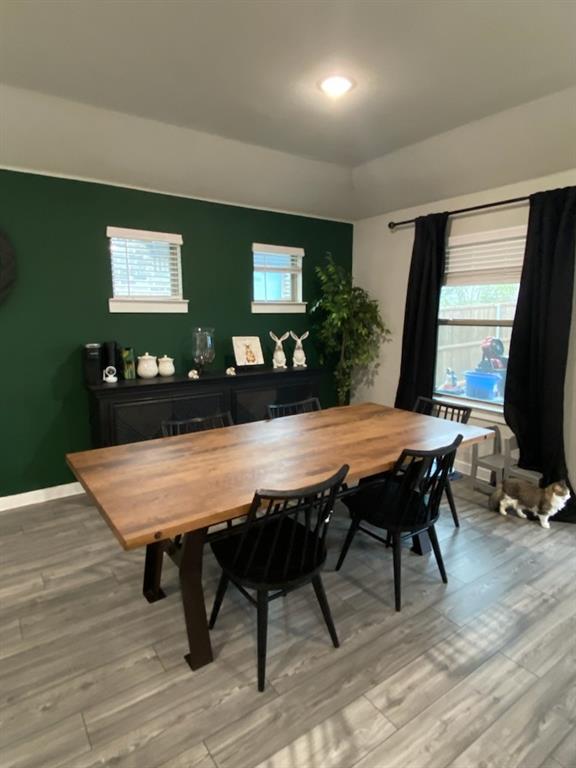 2312 Spring Side Drive Royse City, TX 75189 - Photo 13 of 19 a view of a dining room with furniture and wooden floor