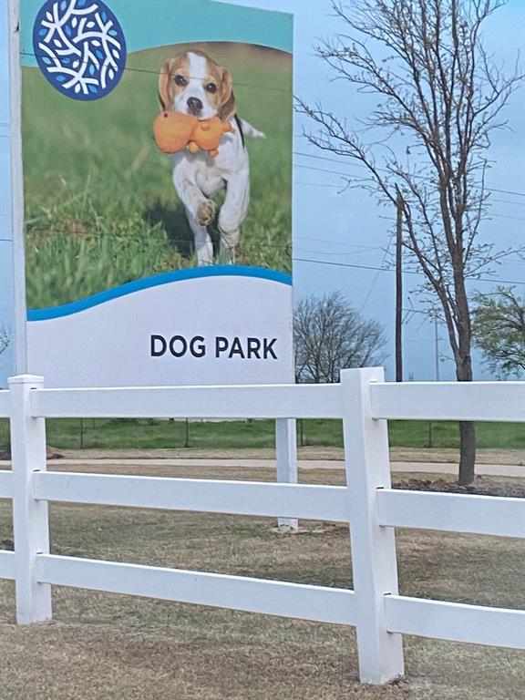 2312 Spring Side Drive Royse City, TX 75189 - Photo 4 of 19 a view of outdoor space with signage and flags