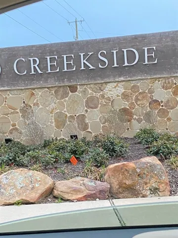 a kitchen with counter top space and cabinets