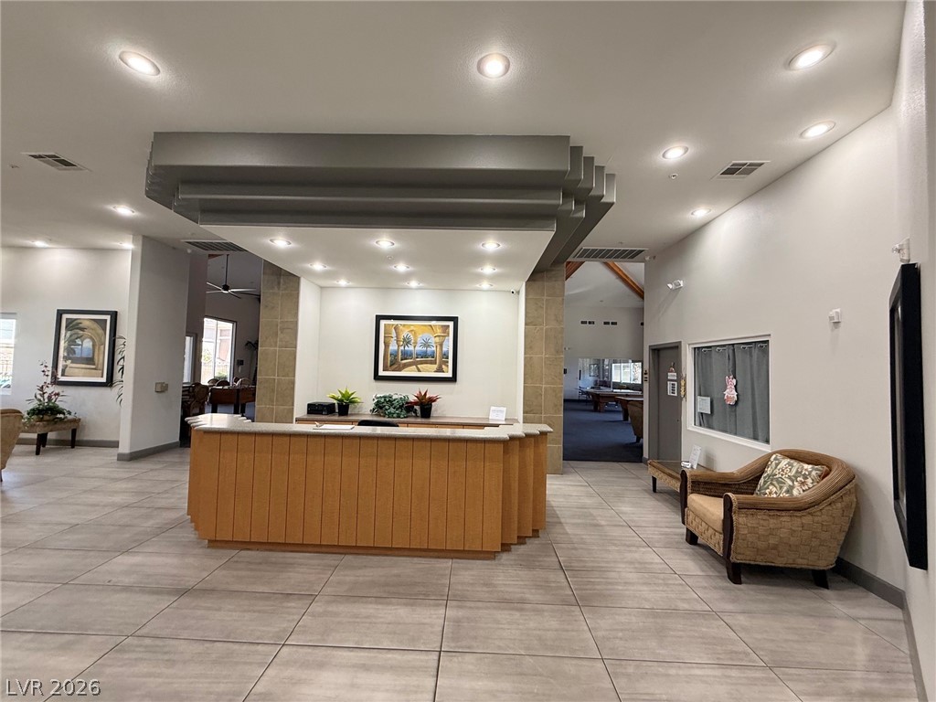 9050 West Warm Springs Road, Unit 2002 Las Vegas, NV 89148 - Photo 41 of 46 This welcoming reception area offers a stylish entry point with thoughtful details.