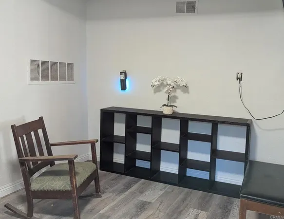 a bathroom with a sink mirror and vanity