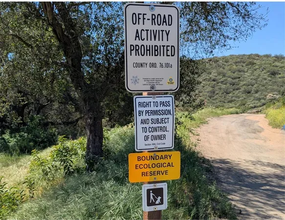 a sign on the side of the road