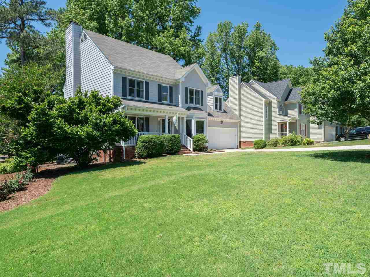 9101 Cub Trail Raleigh, NC 27615 - Photo 2 of 22 a front view of house with yard and green space