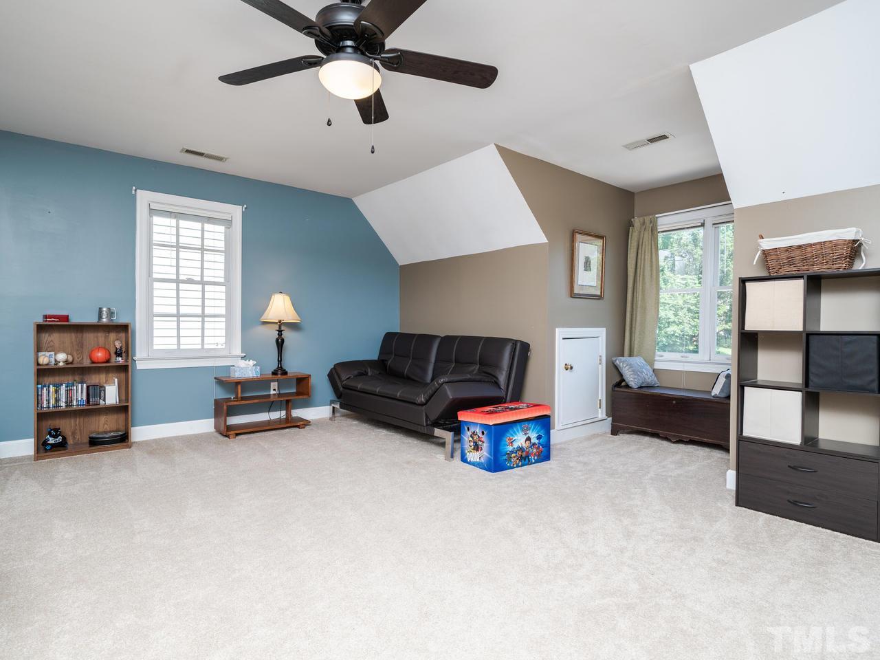 9101 Cub Trail Raleigh, NC 27615 - Photo 15 of 22 a living room with furniture and a window