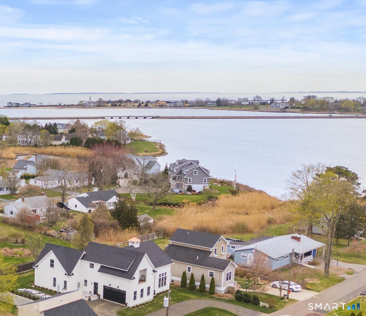 18 Old South Cove Road Old Saybrook, CT 06475 - Photo 4 of 40 a view of a city with an ocean