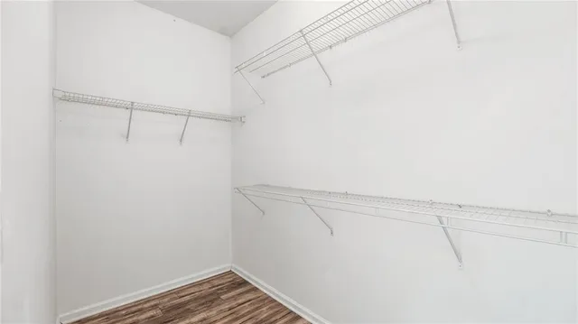 a view of a room with racks on the wall