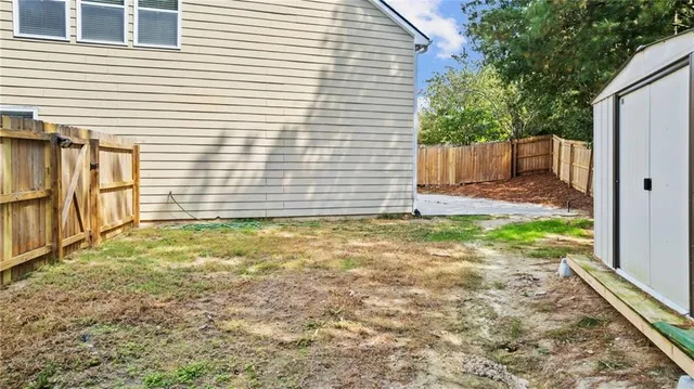 a view of a backyard with a garden