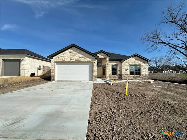 a house view with a outdoor space