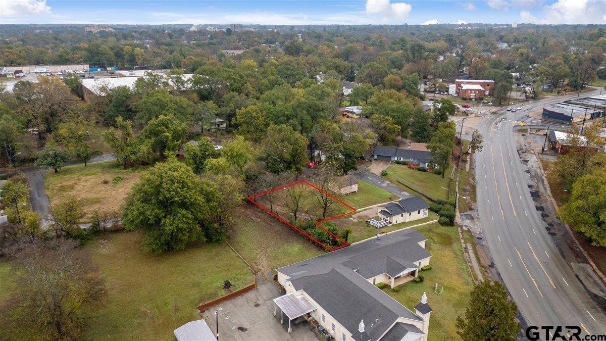 435 South Ross Avenue Tyler, TX 75702 - Photo 12 of 14 an aerial view of a house with a lake view