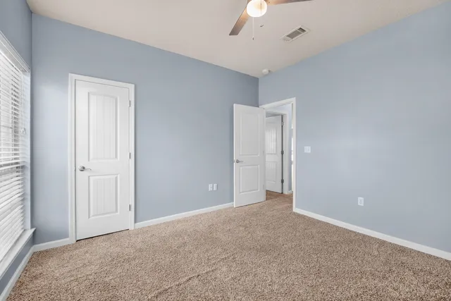 a house with trees in front of it