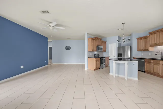 a bathroom with a shower toilet and sink