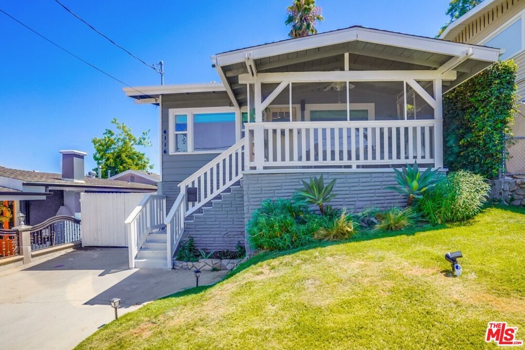 6116 Springvale Drive Los Angeles, CA 90042 - Photo 2 of 33 a front view of a house with a yard