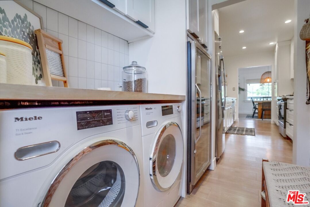 6116 Springvale Drive Los Angeles, CA 90042 - Photo 21 of 33 a view of living room with washer and dryer