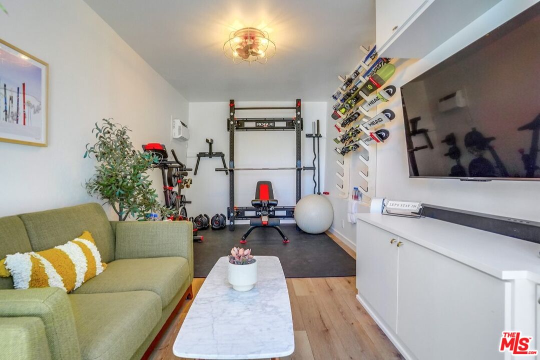6116 Springvale Drive Los Angeles, CA 90042 - Photo 31 of 33 a living room with furniture and a couch