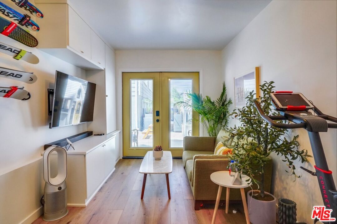 6116 Springvale Drive Los Angeles, CA 90042 - Photo 33 of 33 a living room with furniture and a potted plant