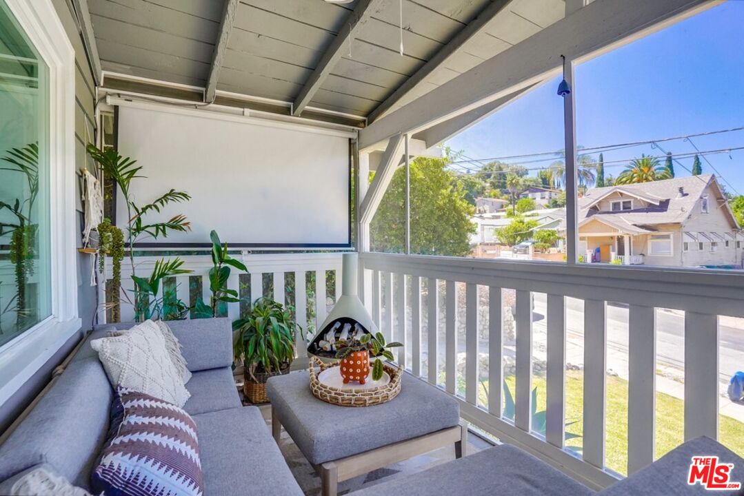 6116 Springvale Drive Los Angeles, CA 90042 - Photo 4 of 33 a outdoor living room with furniture