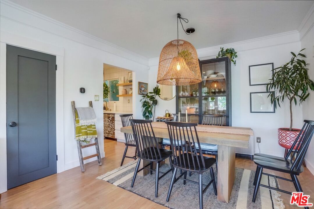 6116 Springvale Drive Los Angeles, CA 90042 - Photo 6 of 33 a view of a dining room with furniture