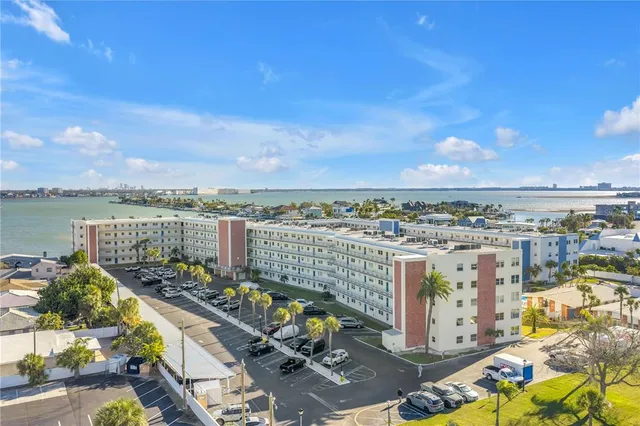 a view of a terrace with wooden floor and city view