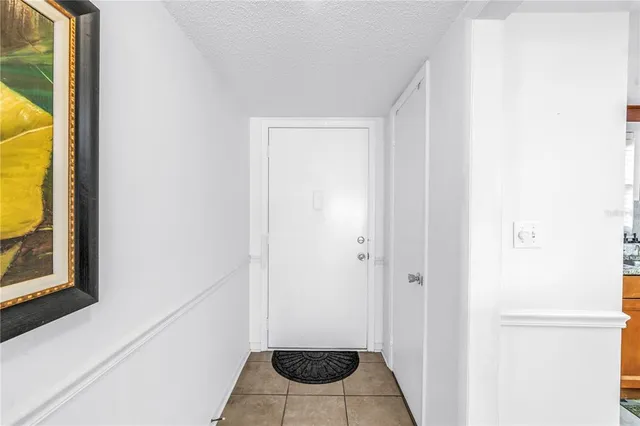 a view of entryway with bathroom