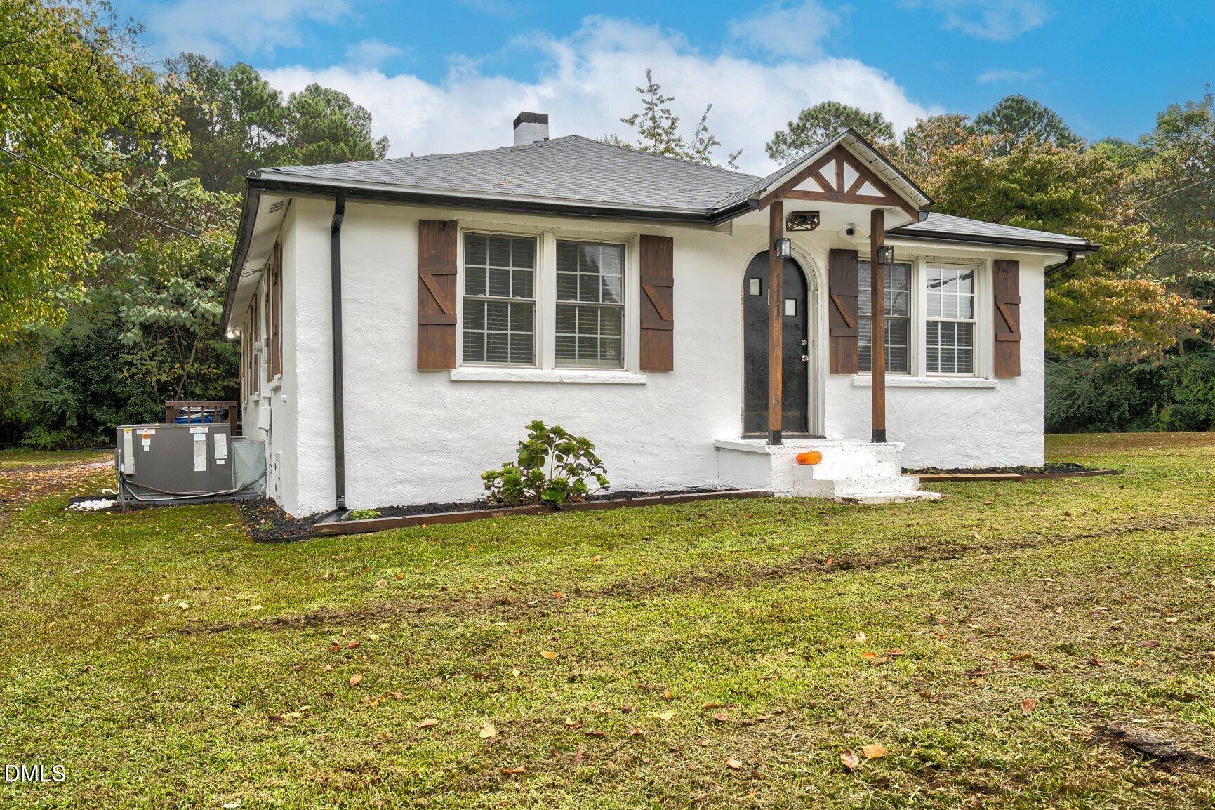 111 South May Street Spring Hope, NC 27882 - Photo 2 of 25 a front view of a house with a yard