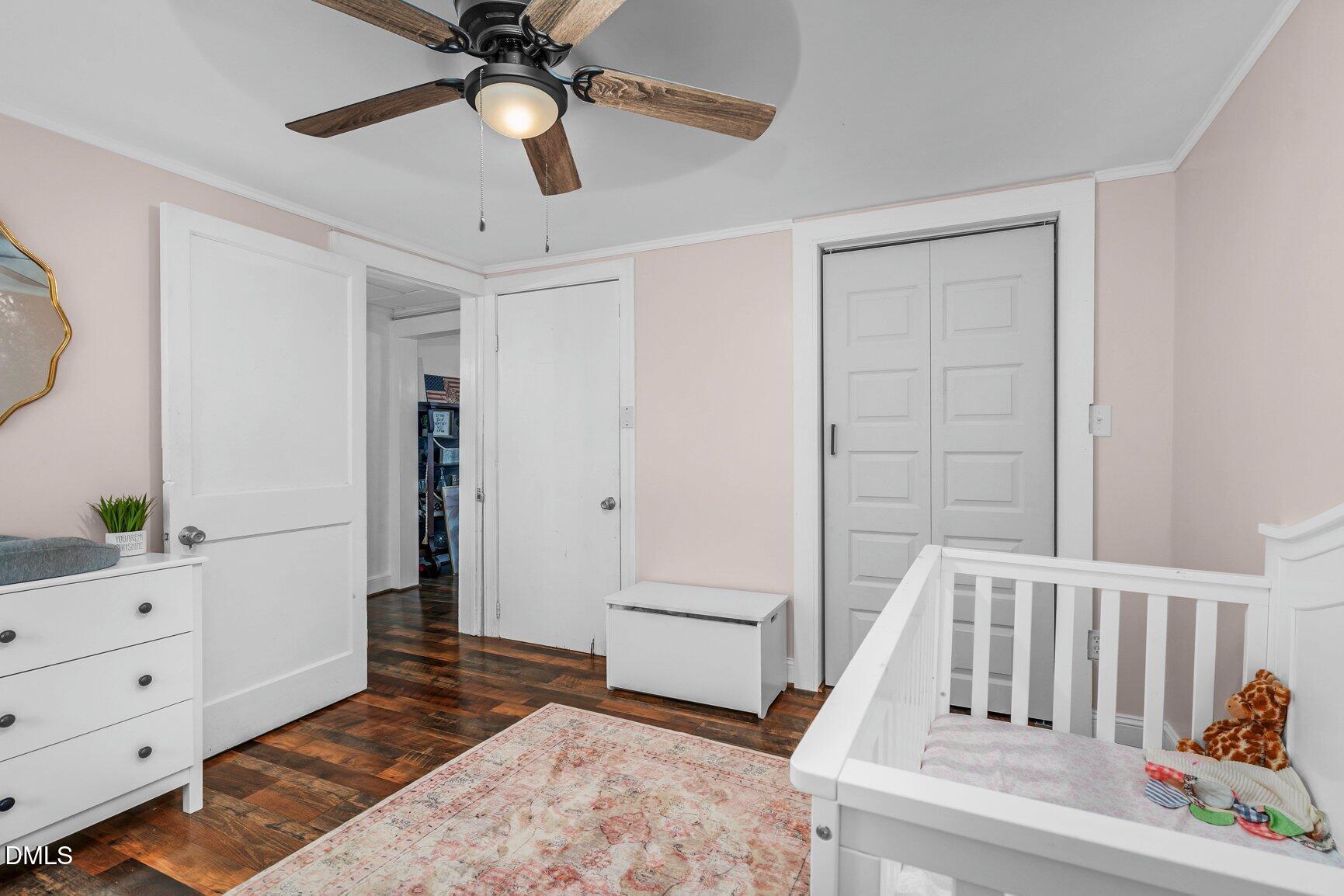 111 South May Street Spring Hope, NC 27882 - Photo 10 of 25 a bedroom with a bed and a rug