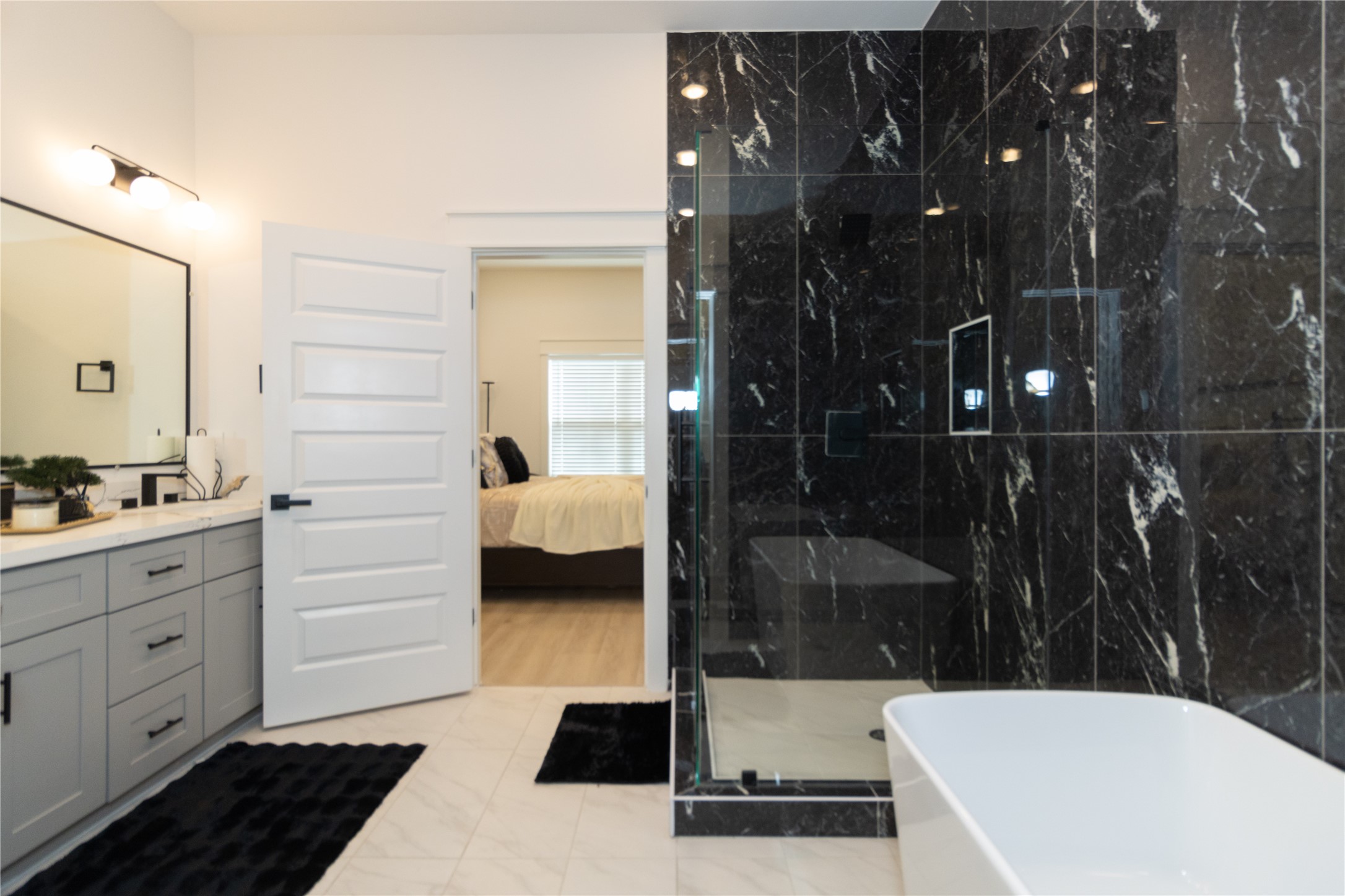 4902 Higgins Street, Unit B Houston, TX 77033 - Photo 21 of 39 a bathroom with a sink a toilet and shower