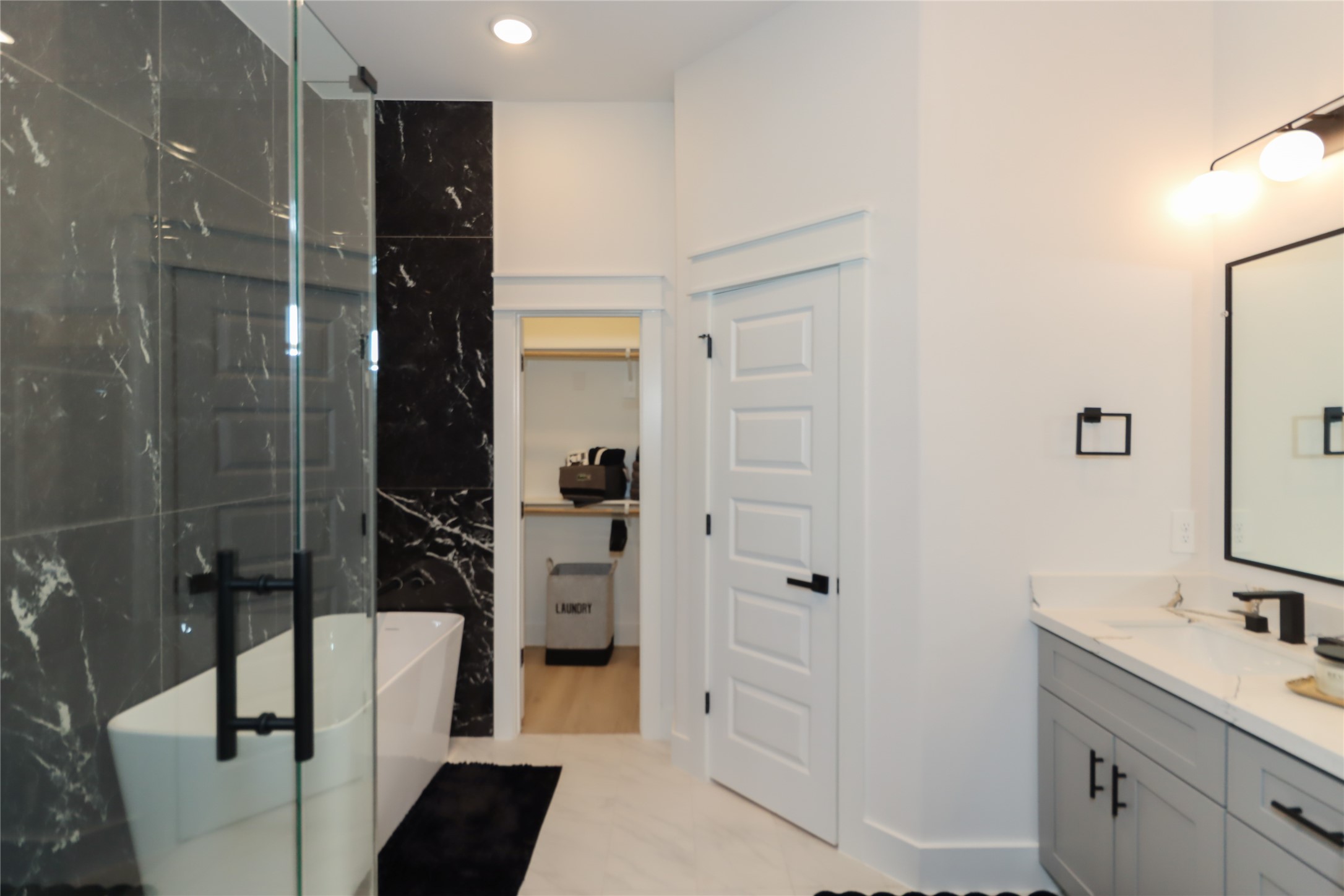 4902 Higgins Street, Unit B Houston, TX 77033 - Photo 24 of 39 a bathroom with a shower and a sink