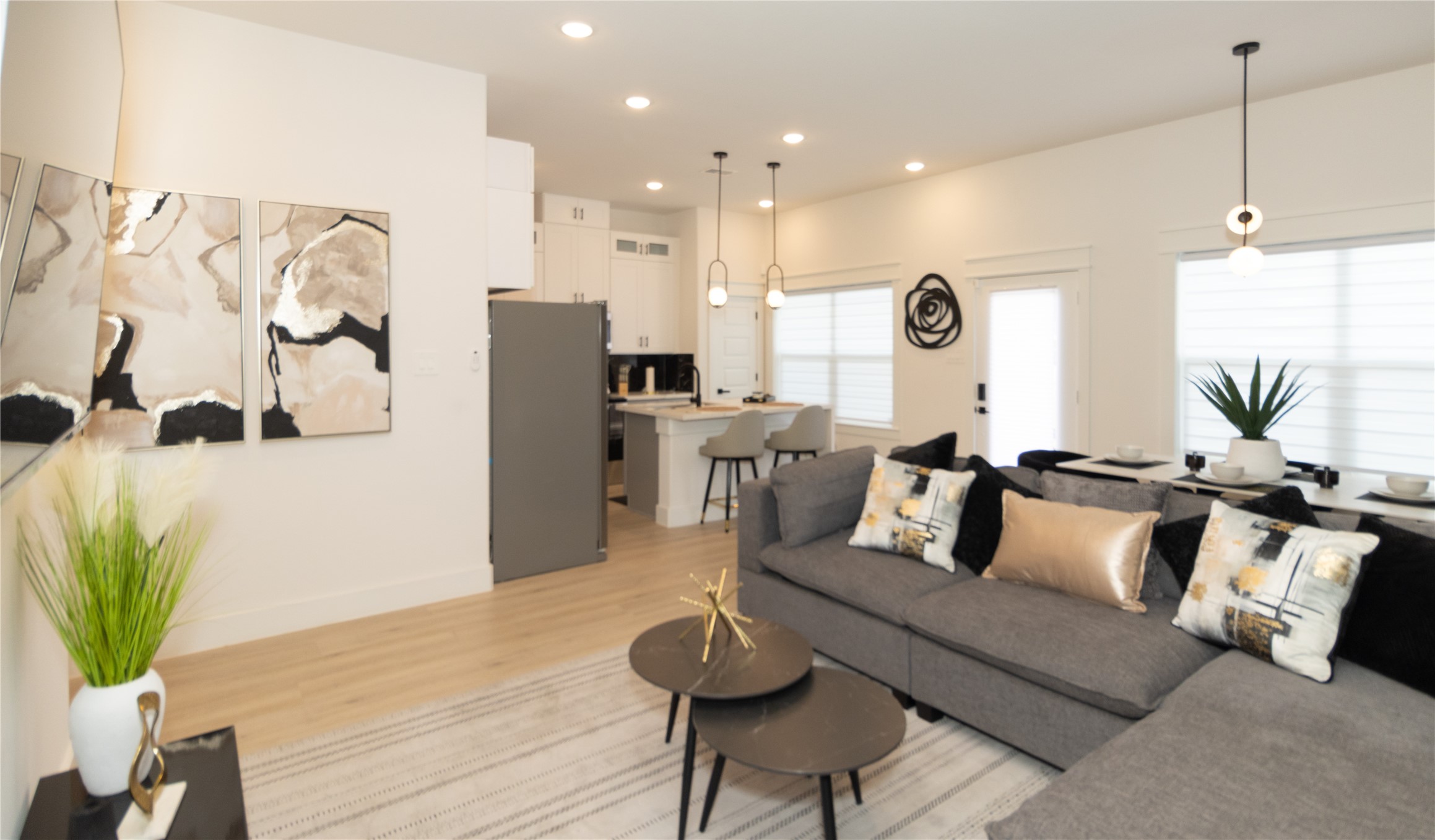 4902 Higgins Street, Unit B Houston, TX 77033 - Photo 3 of 39 a living room with furniture and wooden floor