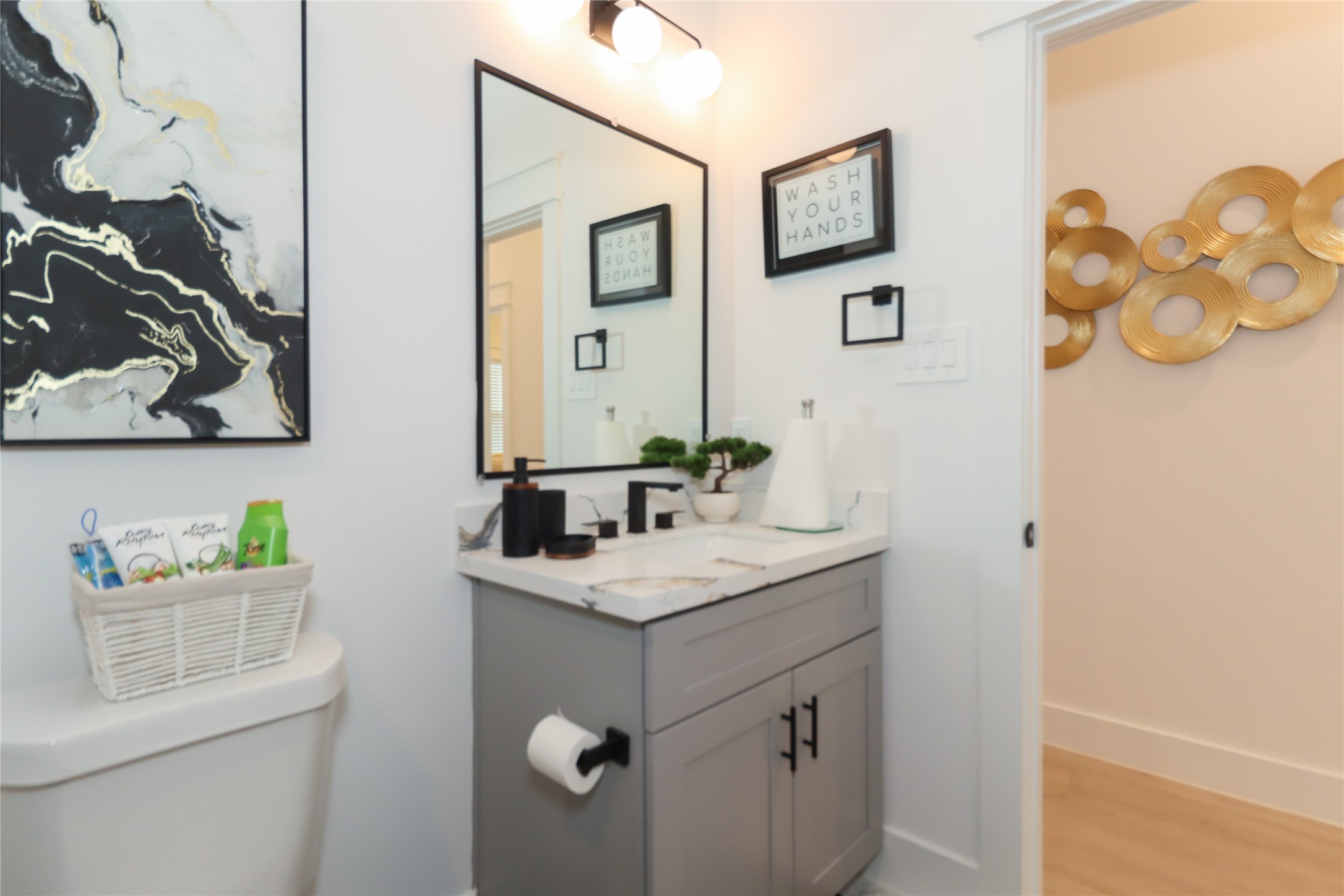 4902 Higgins Street, Unit B Houston, TX 77033 - Photo 34 of 39 a bathroom with a granite countertop sink a mirror and a shower