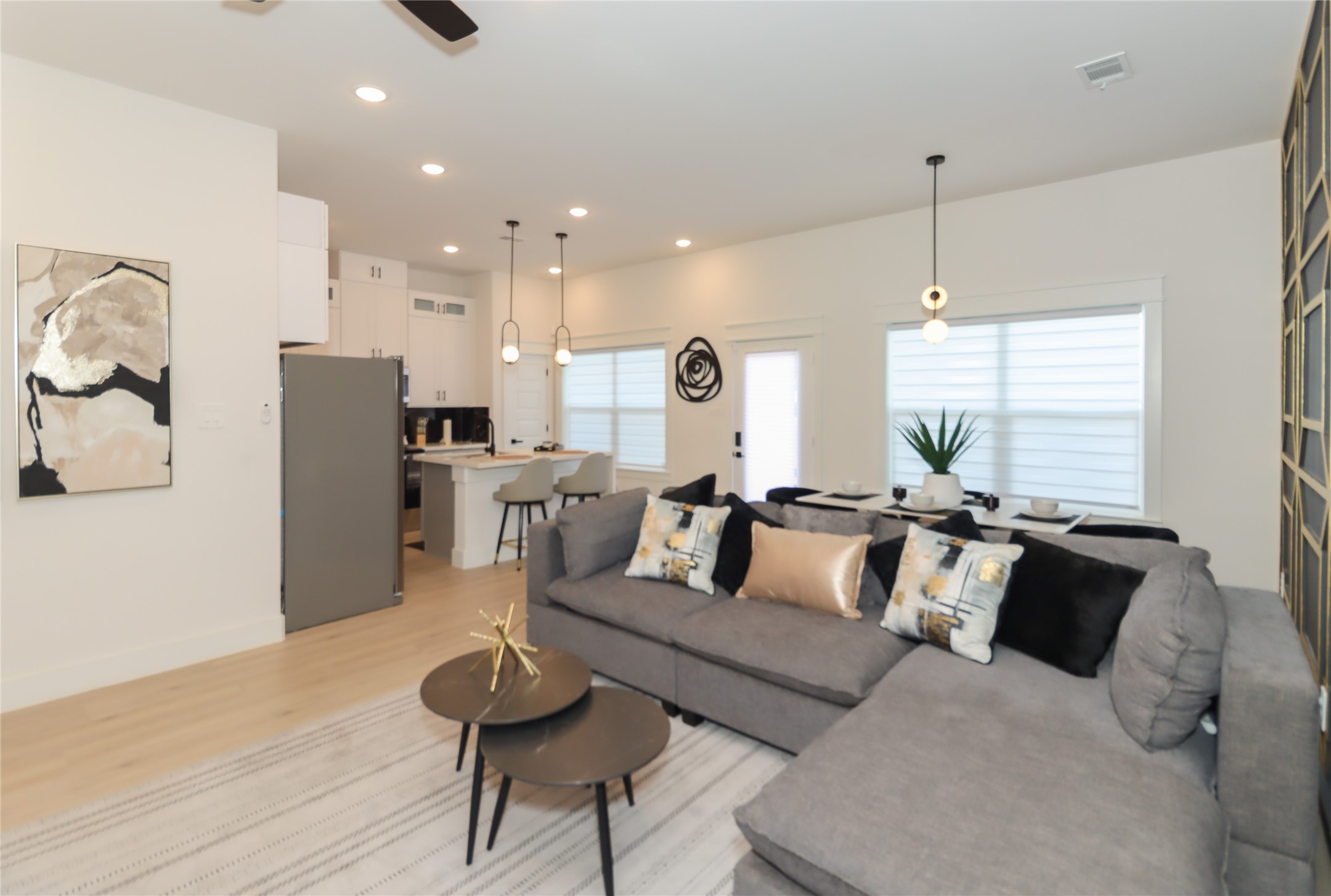 4902 Higgins Street, Unit B Houston, TX 77033 - Photo 5 of 39 a living room with furniture and a large window