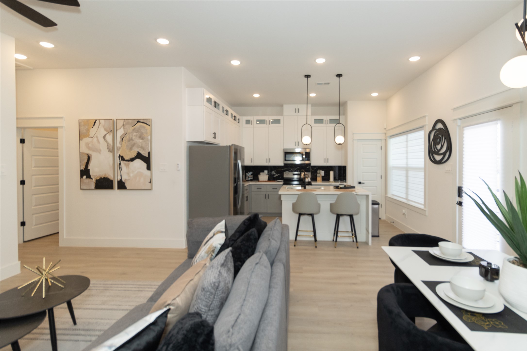 4902 Higgins Street, Unit B Houston, TX 77033 - Photo 7 of 39 a living room with furniture and a large window
