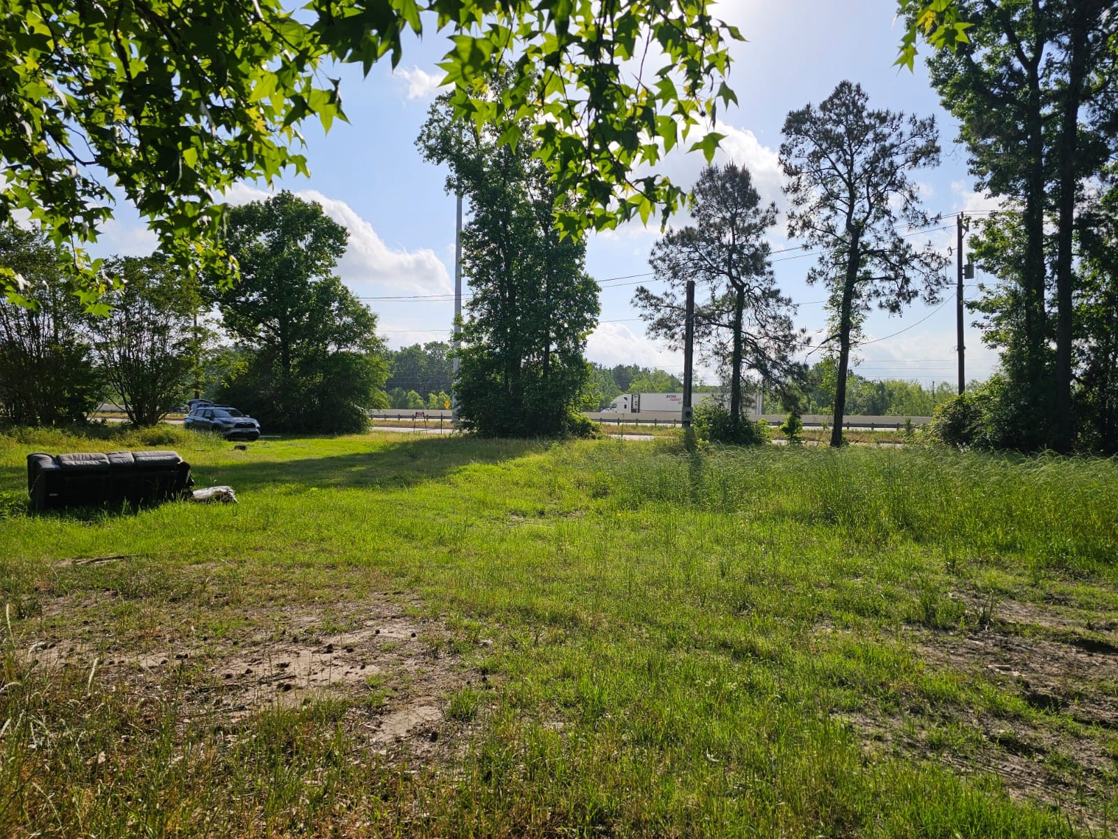 1190 Highway 59 Garrison, TX 75946 - Photo 5 of 12 a view of backyard with swimming pool and green space