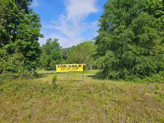 a sign that is on the side of a road