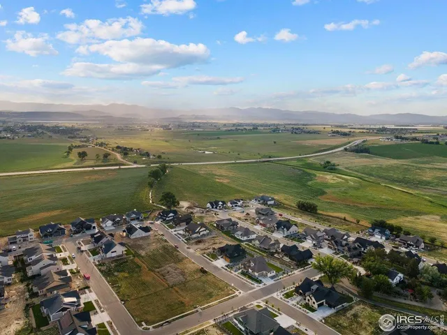 a view of a lake with a city