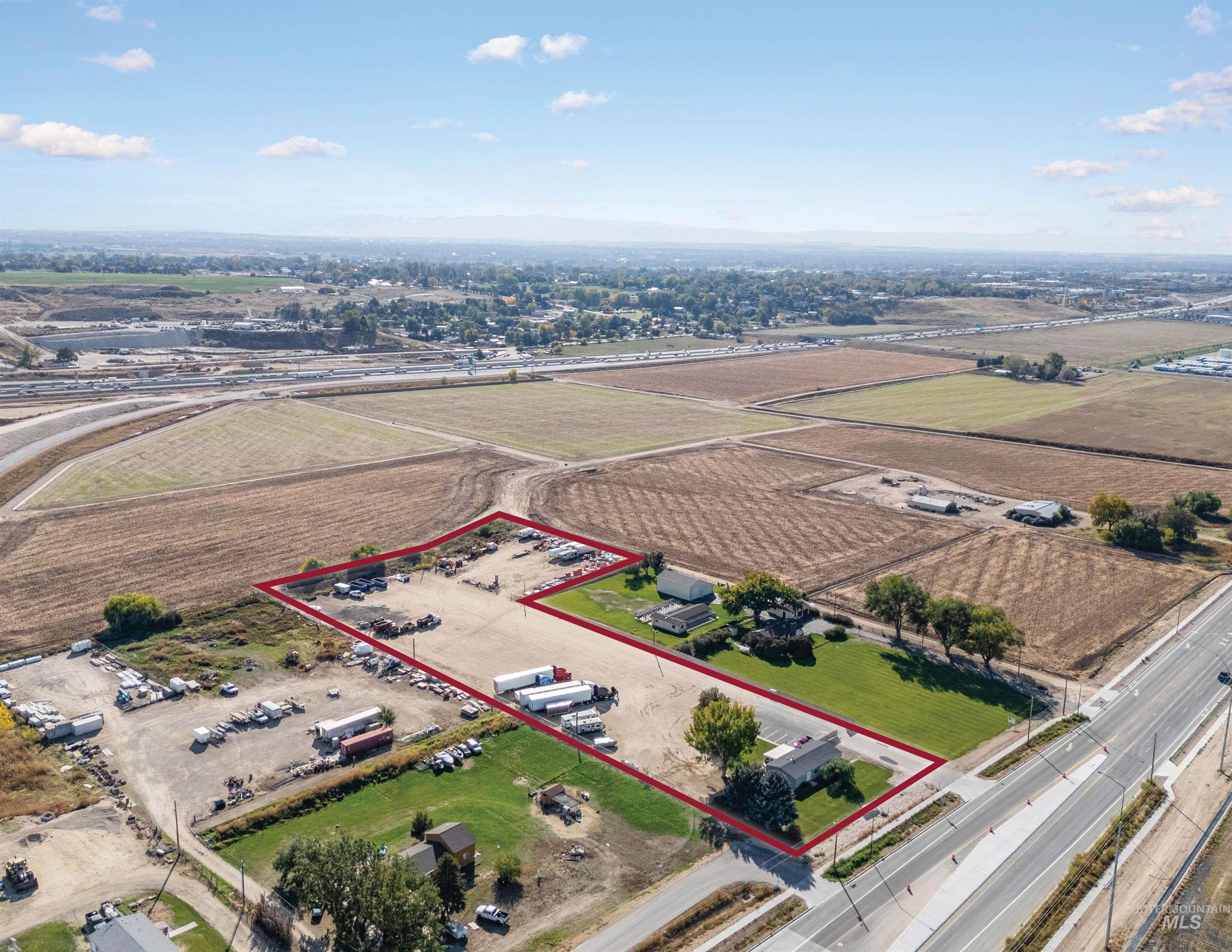Overview of rural landscape with property boundaries highlighted and farmland