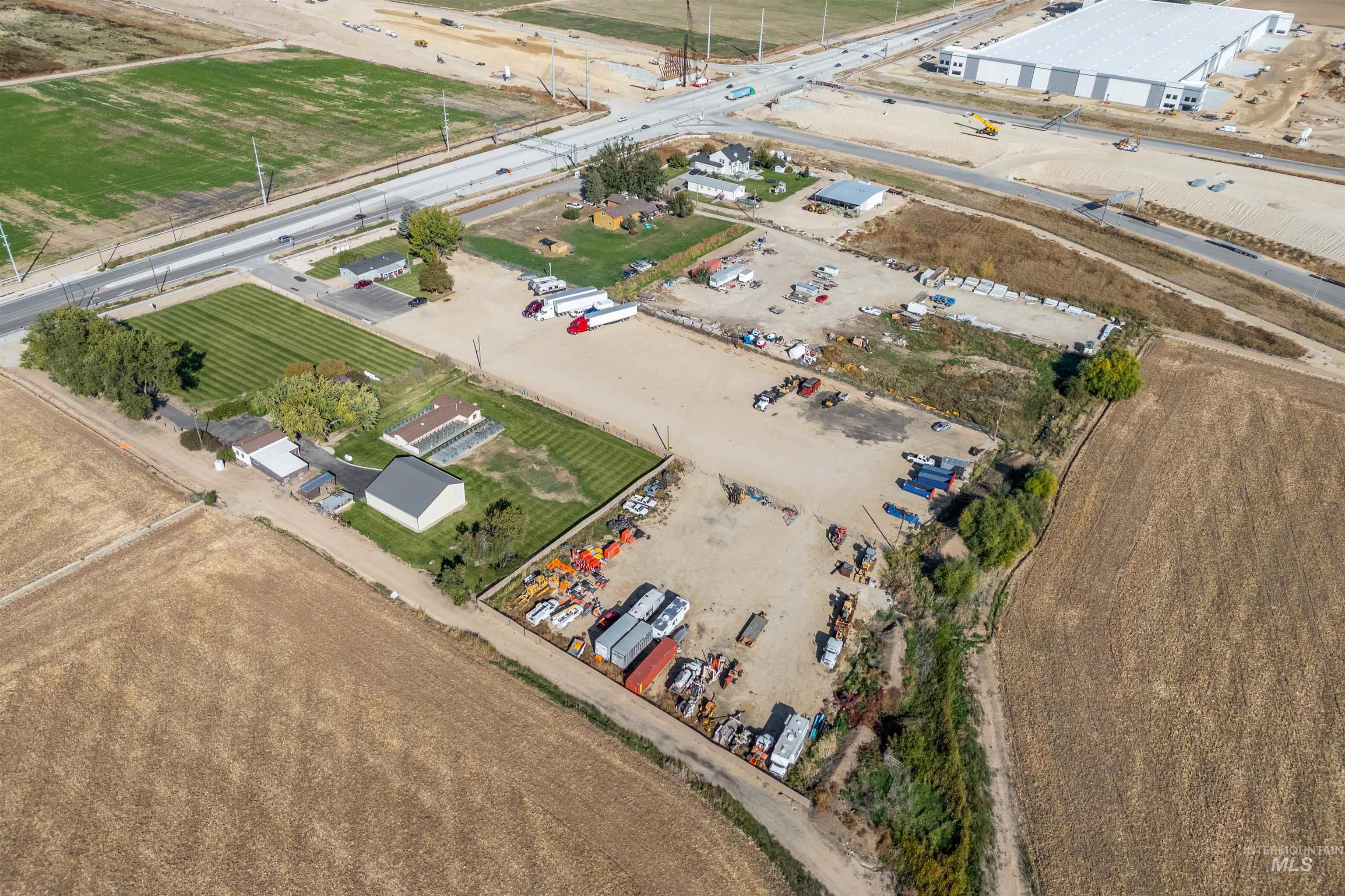 4457 East Franklin Road Nampa, ID 83687 - Photo 3 of 8 Aerial view of property and surrounding area with rural landscape and extensive farmland