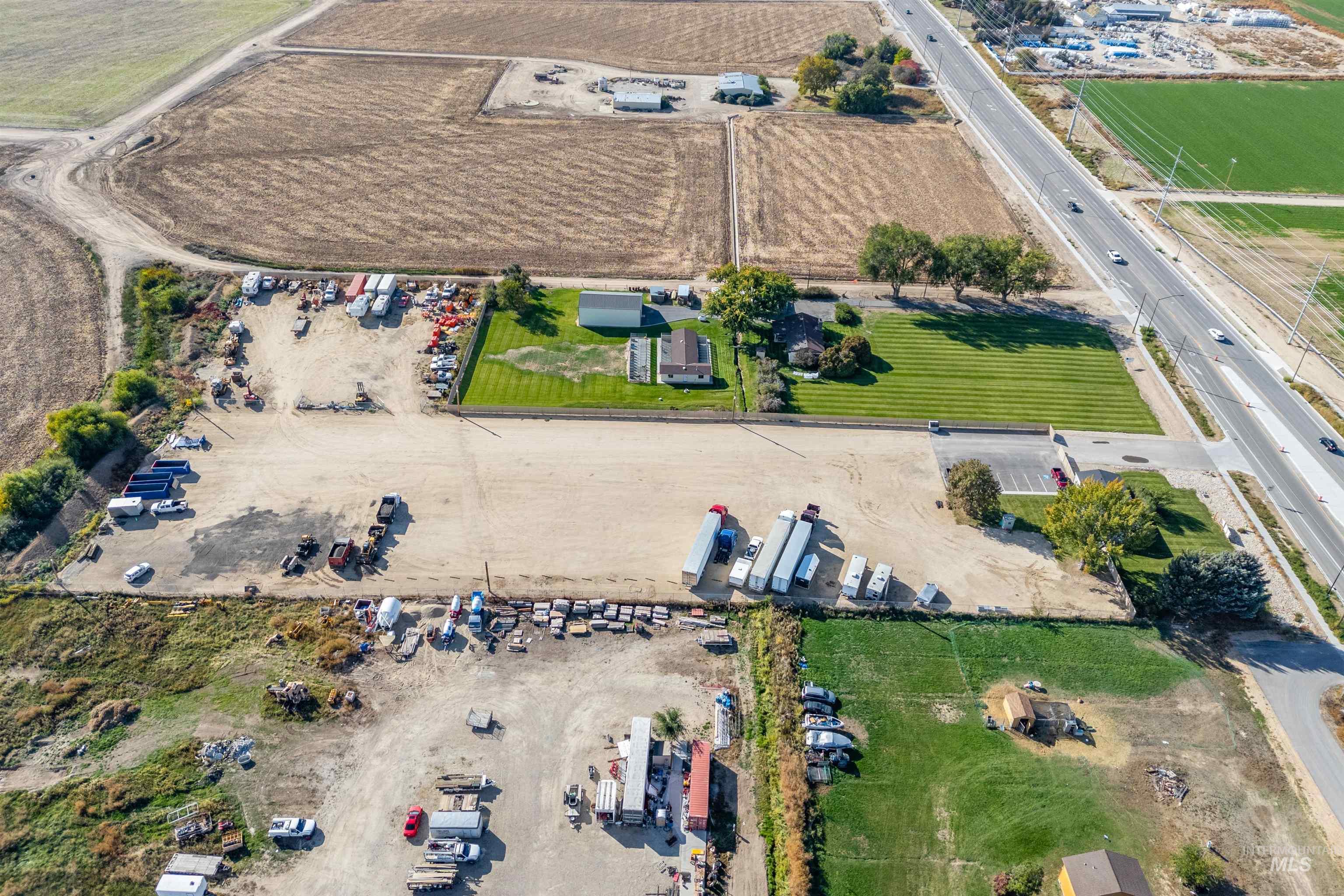 4457 East Franklin Road Nampa, ID 83687 - Photo 6 of 8 Aerial view of property and surrounding area featuring rural landscape and large plots for crops